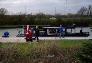Santa was busy before Christmas seeing children in Wichelstowe, courtesy of the Wilts and Berks Canal Trust's narrowboat 'Dragonfly'.